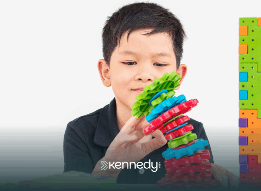 A kid with autism playing with colorful toys