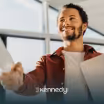 An autistic adult shaking the hands of his employer