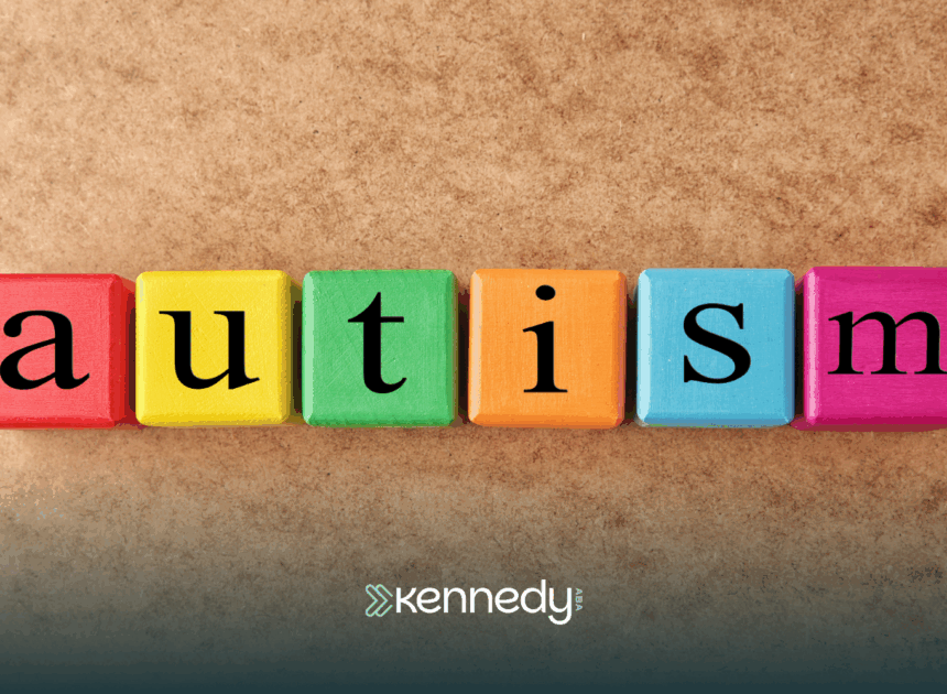 Colorful cubes that spell the word "autism"