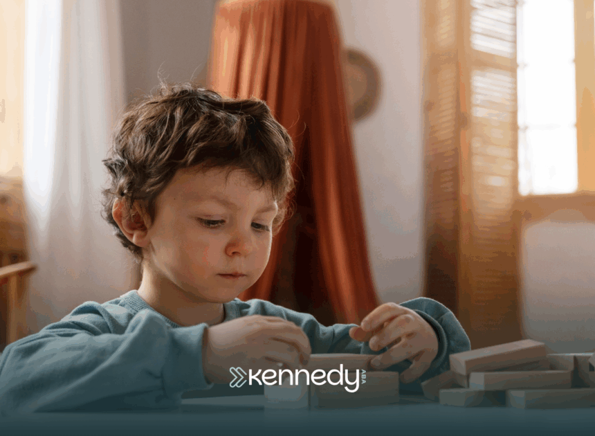 A kid with autism playing on a table
