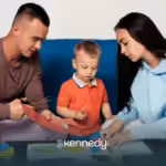 Parents doing ABA therapy with their son