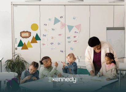 A teacher with her students during ABA therapy in the classroom