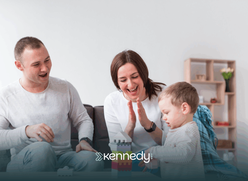 Two parents joining their child in ABA therapy