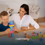 A kid with autism and his RBT during ABA therapy