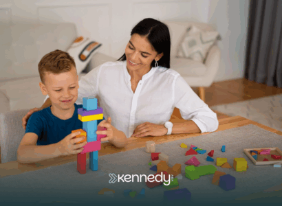 A kid with autism and his RBT during ABA therapy