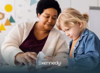 An RBT and a child playing together during ABA therapy