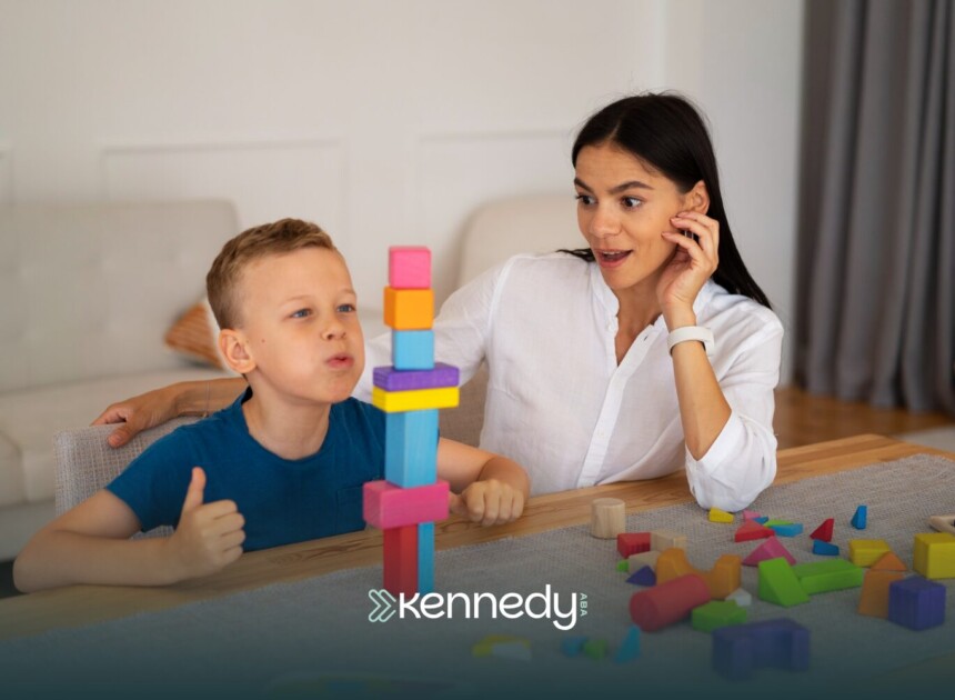 A kid with autism and an RBT during ABA therapy