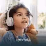 A kid with autism wearing noise-canceling headphones