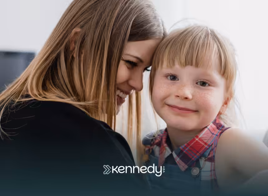 A mom and her daughter smiling together