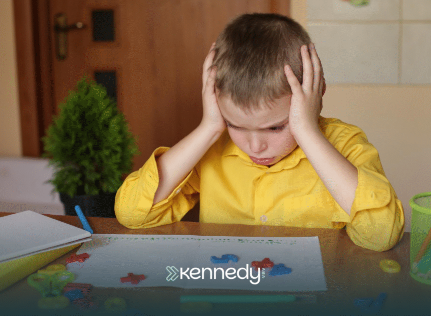 A kid with autism being overstimulated while doing his homework