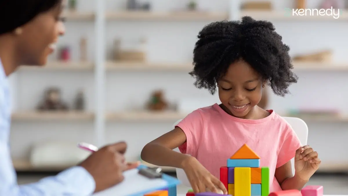 child-building-colorful-blocks-during-play-based-learning-session