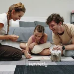family-doing-art-activity-together-with-young-child-at-home