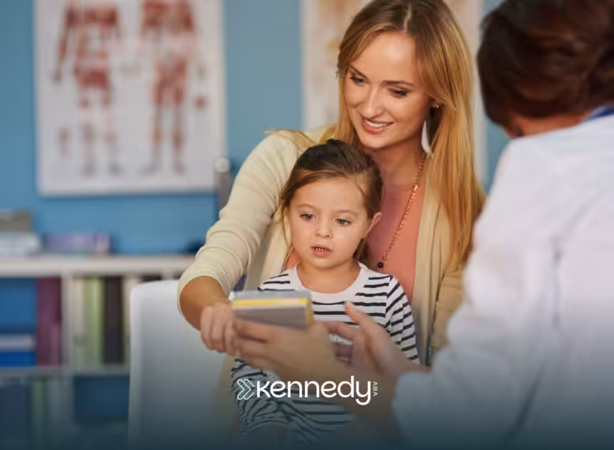 A mom with her daughter speaking to a doctor