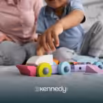 A kid and his ABA therapist playing with wooden toys during ABA therapy at home