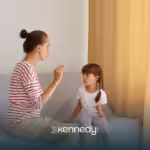 A mother helping her daughter with autism sspeak