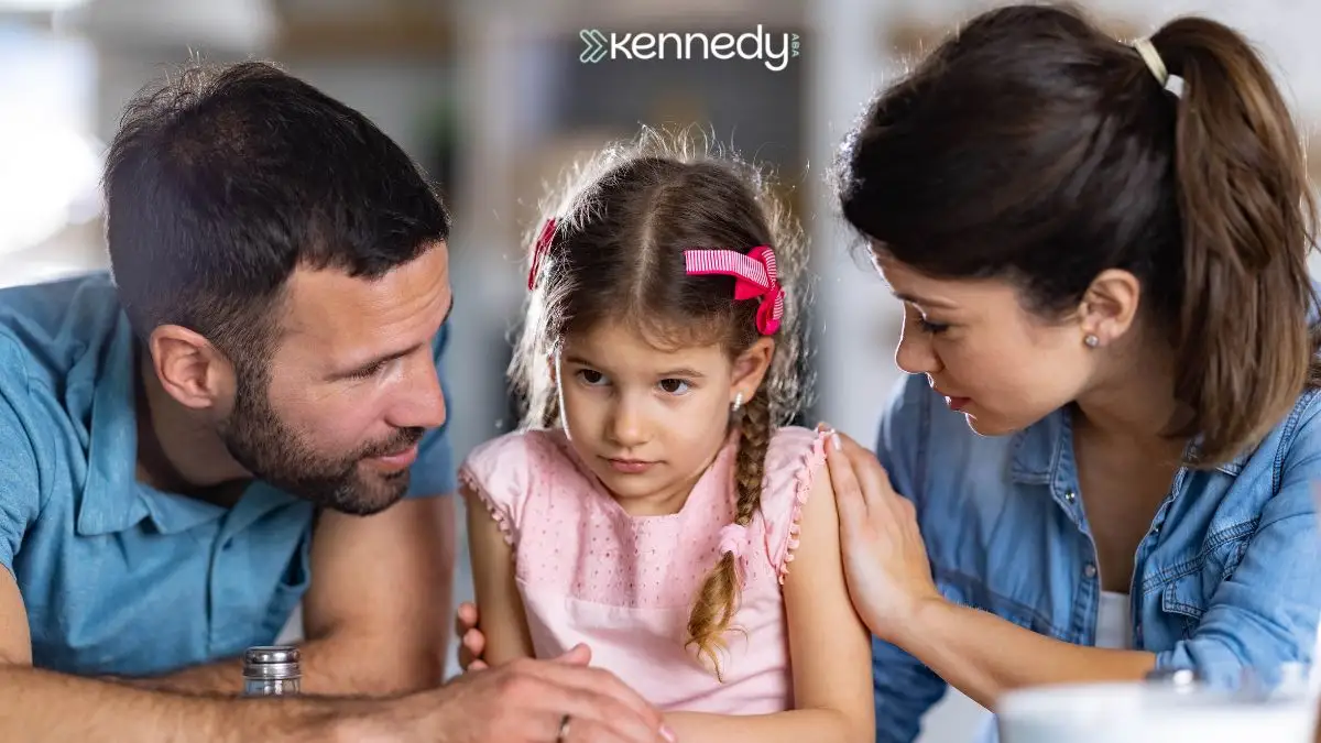 parents-comforting-young-girl-during-family-support-conversation-at-home