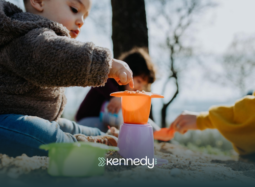 A kid with autism on a weekend activity, playing sand outdoors