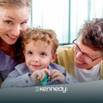A kid with autism and his parents during ABA parent training
