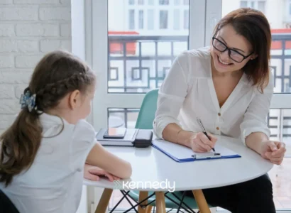 child-meeting-with-aba-therapist-at-table
