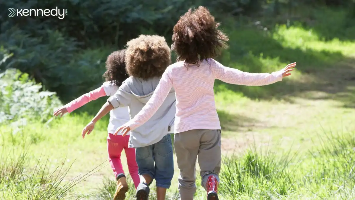 children-walking-on-forest-trail-outdoors