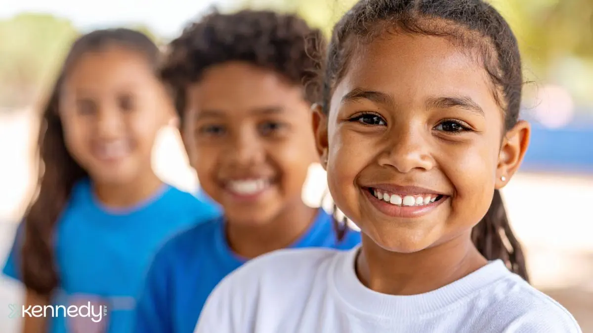 happy-school-children-posing-outside