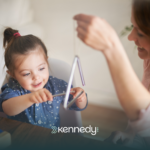 A nonverbal kid with autism and an RBT during ABA therapy