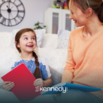 A kid with autism and her ABA therapist during ABA therapy