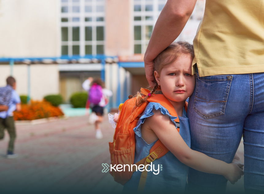 A kid hugging her parent's legs, refusing to go to school
