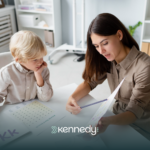 A BCBA talking to a kid with autism during evaluation