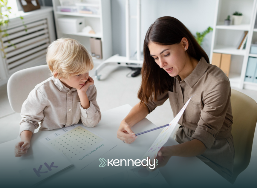 A BCBA talking to a kid with autism during evaluation