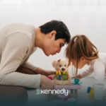 A father and her daughter with autism playing together