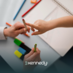 A child pointing a colored pencils during ABA therapy