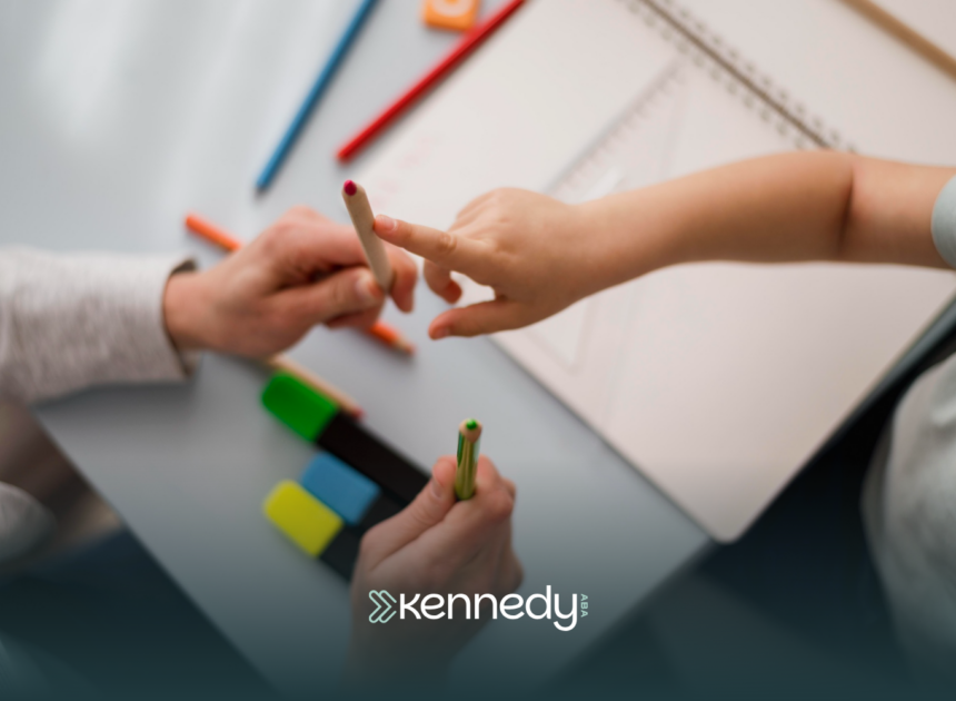 A child pointing a colored pencils during ABA therapy