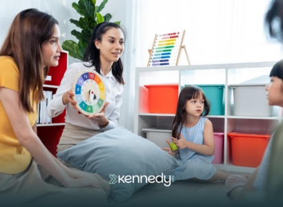 Therapists talking to kids during ABA therapy
