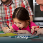 A kid with autism doing school works