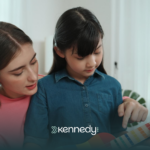 An ABA therapist teaching an autistic kid in expressing references