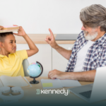 A BCBA and a kid with autism talking during school-based ABA