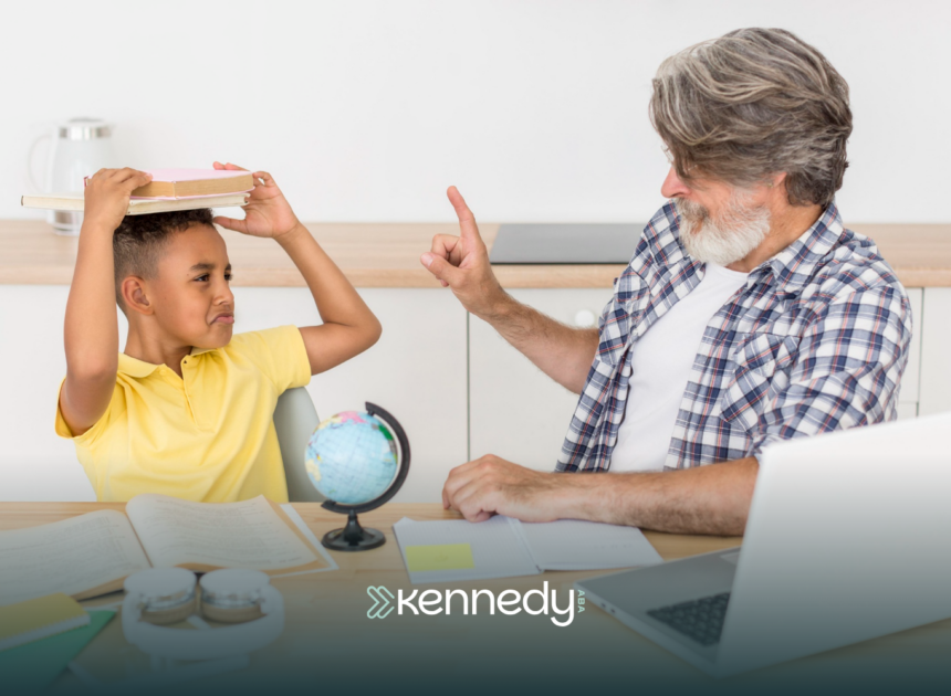 A BCBA and a kid with autism talking during school-based ABA
