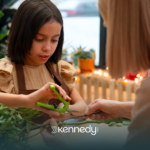 A parent doing a naturalistic teaching technique qith her kid with autism