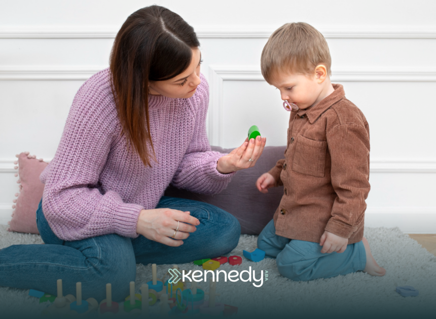 A BCBA and a kid with autism during ABA therapy