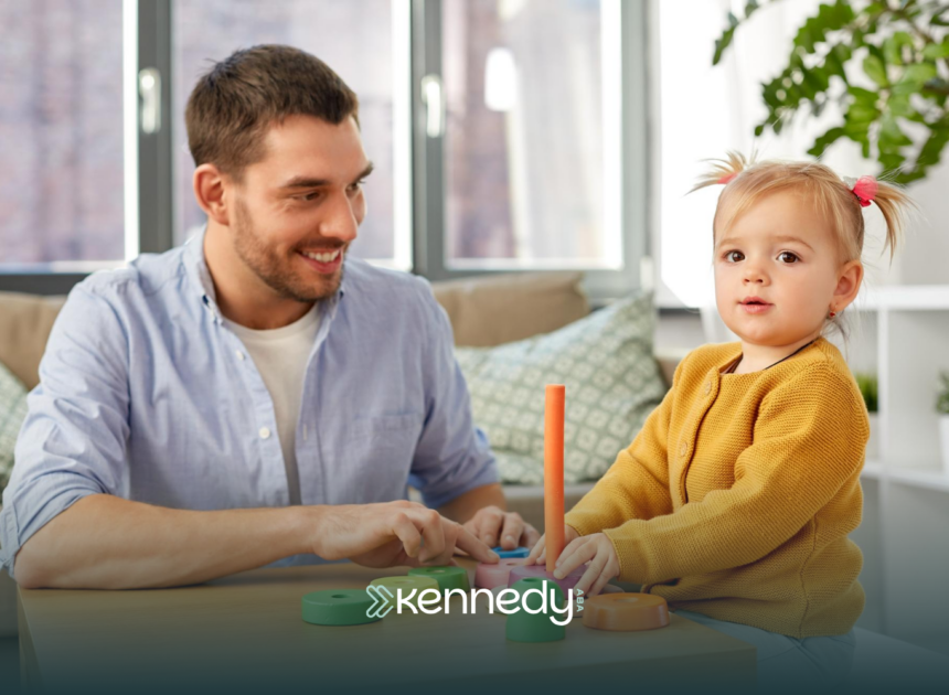 A father tracking her daughter's progress during ABA therapy
