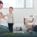 A family of three during ABA therapy