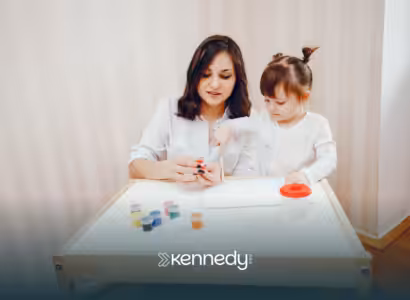 A child and an ABA therapist during ABA therapy