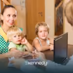 A mother, with her kids asking, asking questions to an insurance representative