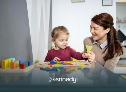 A kid and an ABA therapist during individualized ABA therapy