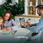 A BCBA with a kid and her mom during in-home ABA therapy
