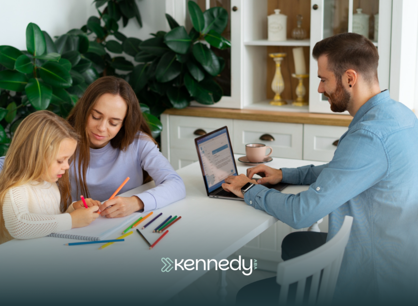A BCBA with a kid and her mom during in-home ABA therapy