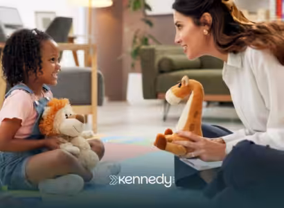 A kid and a BCBA talking to each other during ABA therapy
