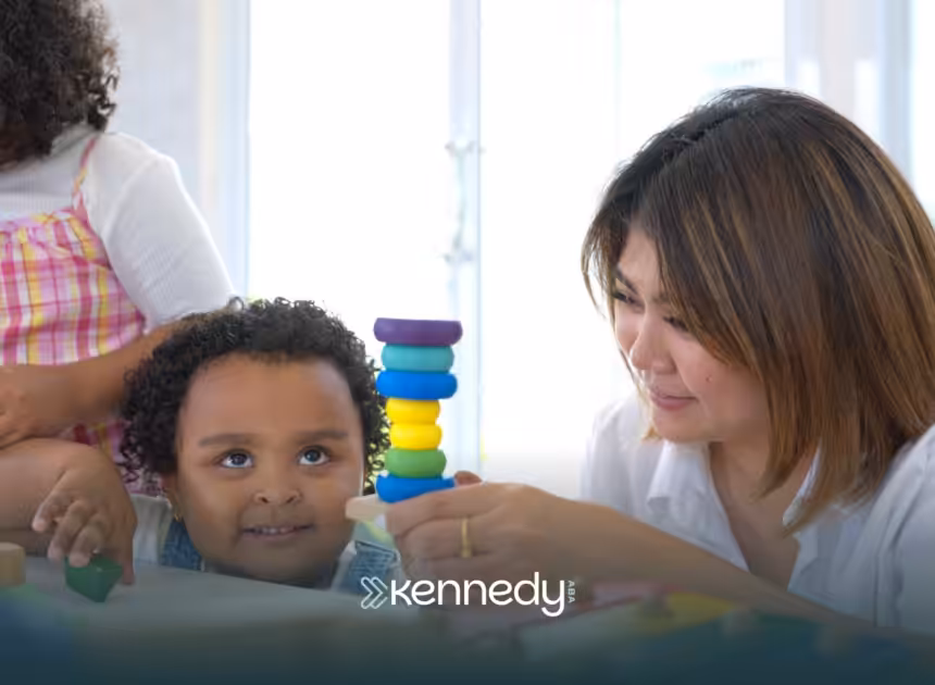A kid and a BCBA during ABA therapy